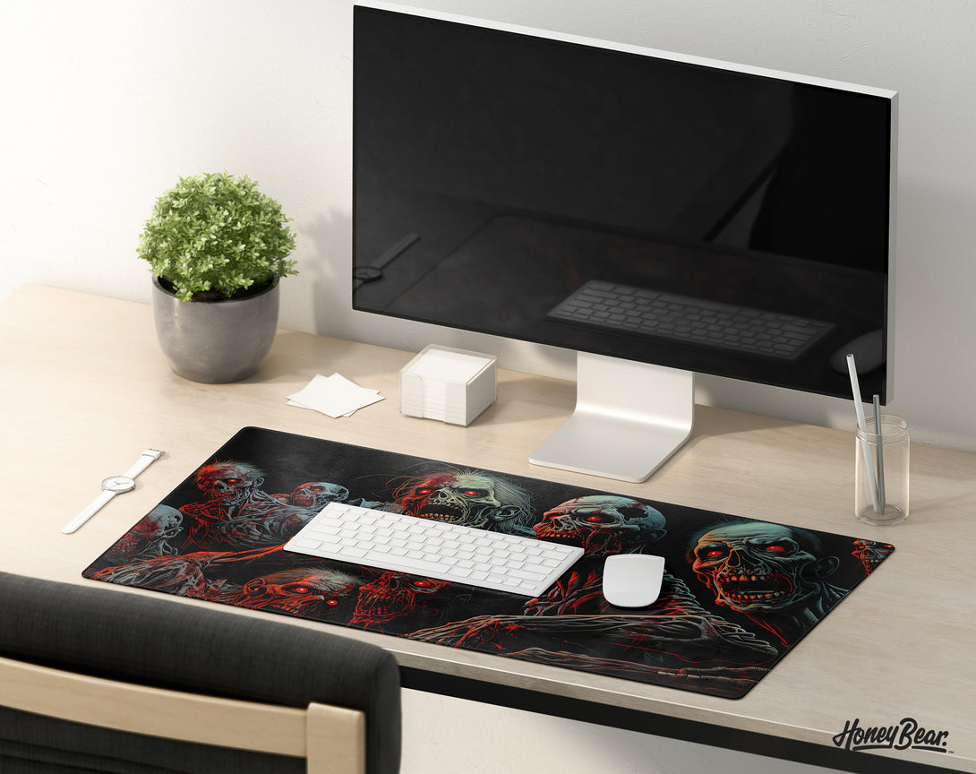 Detailed horror-themed gaming desk mat from Honey Bear, featuring a chilling array of zombies with glowing red eyes, designed to provide a thrilling backdrop for gaming sessions
