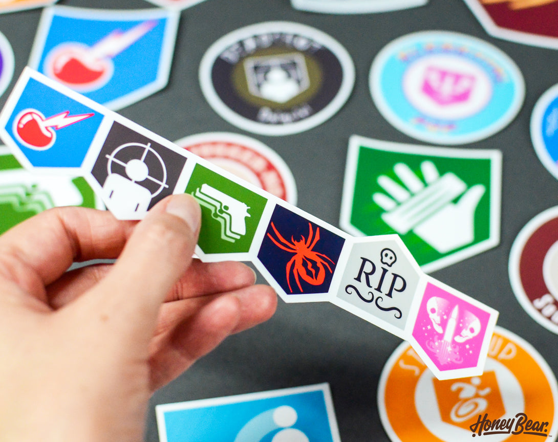 Close-up of detailed zombie game perk stickers, crafted from glossy, durable material for long-lasting use.
