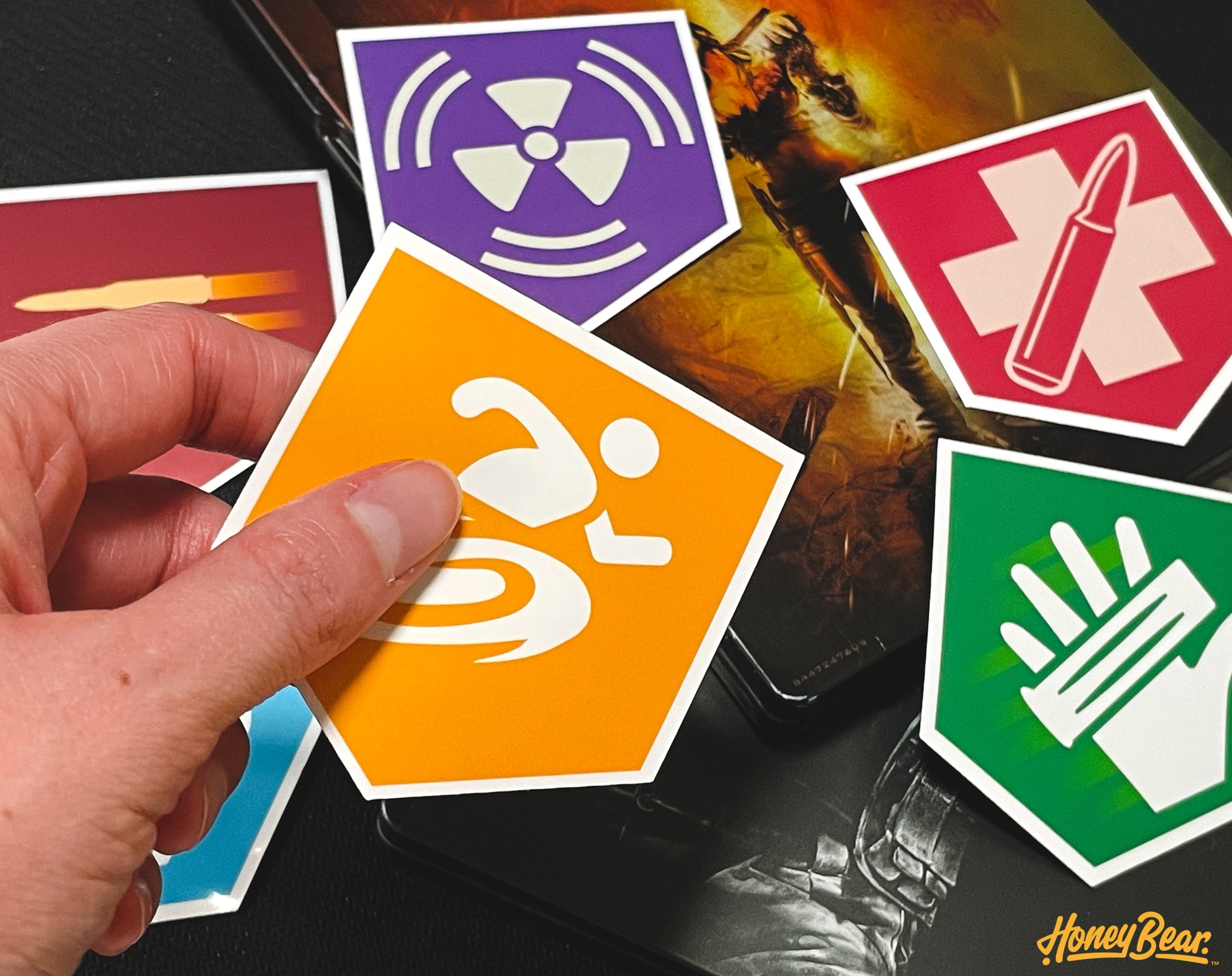 Display of vinyl decal stickers, each celebrating a different survival perk from beloved zombie games.